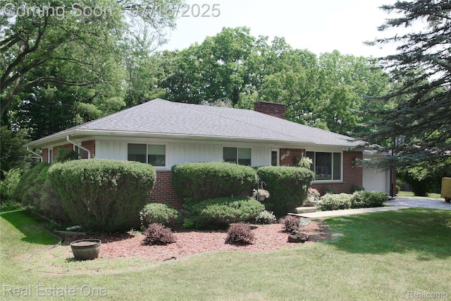 483 Rochdale Dr S, Rochester Hills, MI 48309 - ranch-style home featuring brick siding, an attached garage, a front lawn, and a chimney