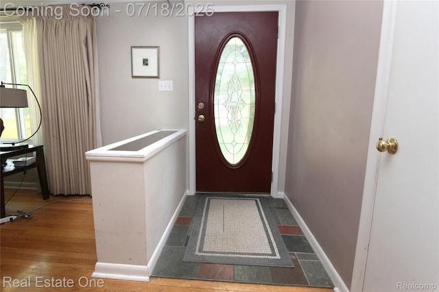 483 Rochdale Dr S, Rochester Hills, MI 48309 - foyer entrance with baseboards and wood finished floors