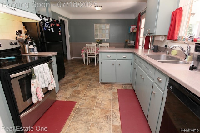 483 Rochdale Dr S, Rochester Hills, MI 48309 - kitchen with stainless steel range with electric stovetop, exhaust hood, black dishwasher, light countertops, and stone finish floors
