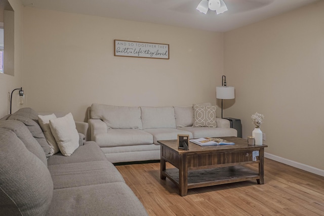 935 N Ave, Battle Creek, MI 49017 - living area with light wood-type flooring and ceiling fan