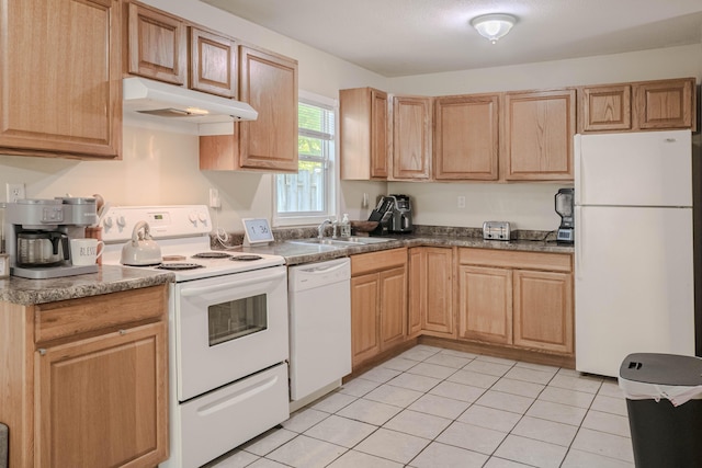 935 N Ave, Battle Creek, MI 49017 - kitchen with white appliances, under cabinet range hood, light tile patterned flooring, and light brown cabinetry