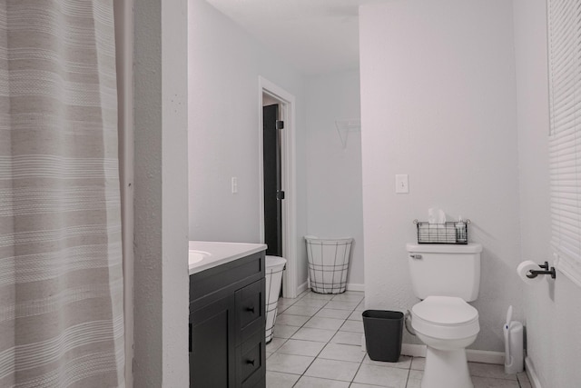 935 N Ave, Battle Creek, MI 49017 - bathroom with vanity, tile patterned floors, and a shower with curtain