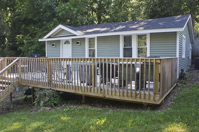 93402 Lee Dr Unit 1, Dowagiac, MI 49047 - view of front of home with a deck and a shingled roof