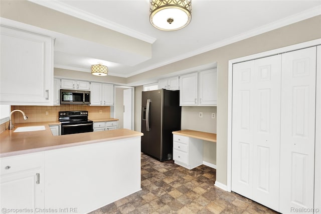 4770 Hedgewood Dr, Bloomfield Hills, MI 48301 - kitchen with appliances with stainless steel finishes, ornamental molding, light countertops, white cabinetry, and backsplash