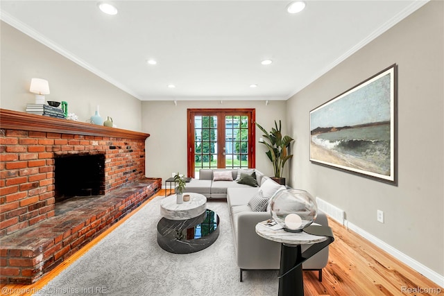 4770 Hedgewood Dr, Bloomfield Hills, MI 48301 - living area featuring recessed lighting, wood finished floors, french doors, a fireplace, and crown molding