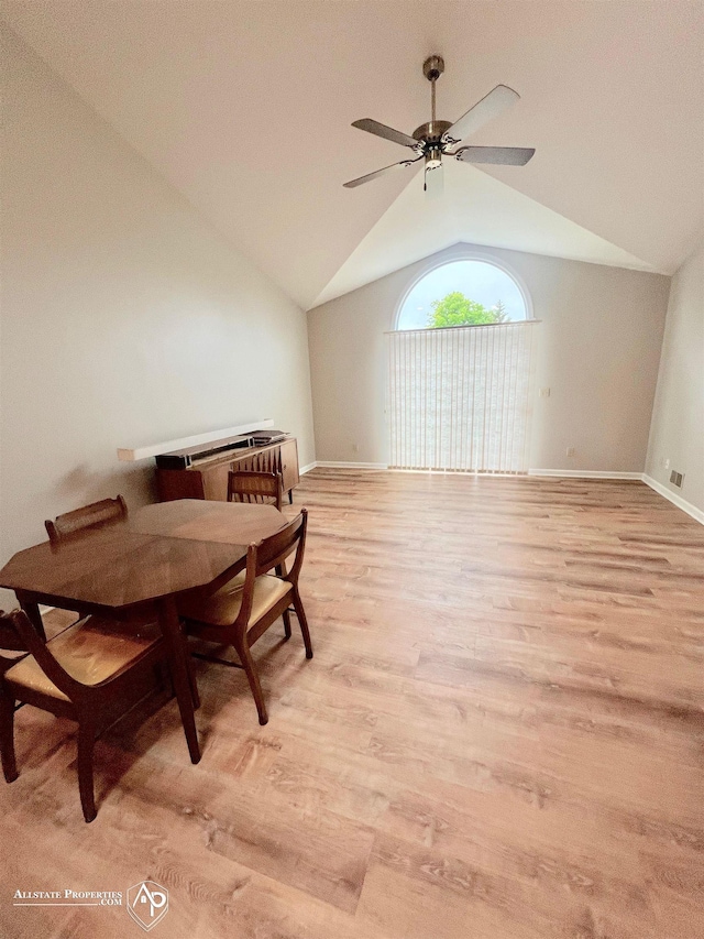 9330 Pinecrest Ct, Davison, MI 48423 - dining area featuring ceiling fan, light wood-style floors, and vaulted ceiling