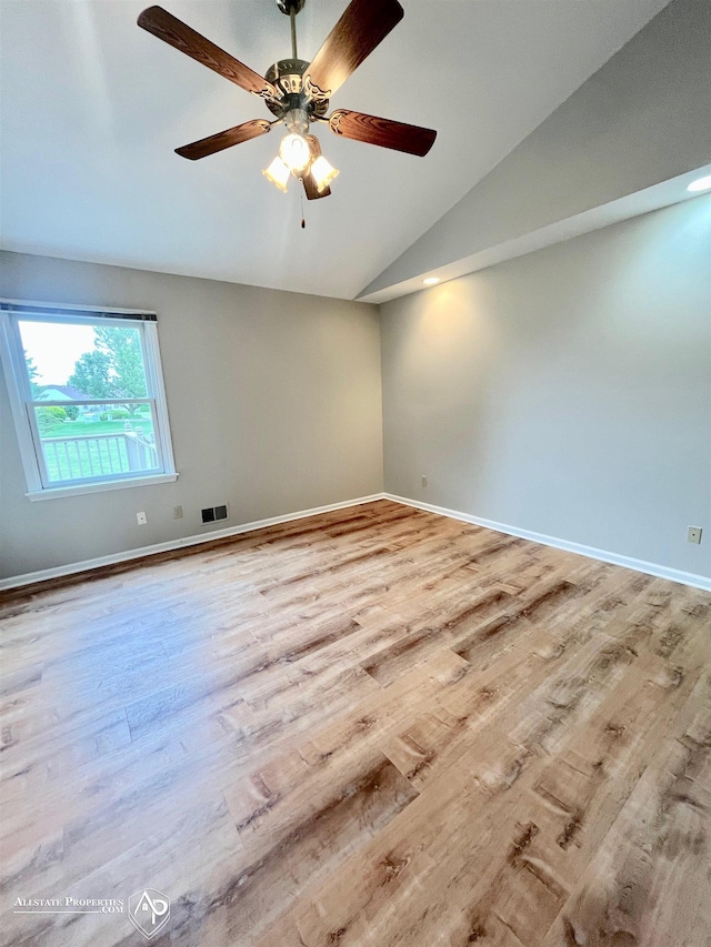 9330 Pinecrest Ct, Davison, MI 48423 - unfurnished room with vaulted ceiling, wood finished floors, and a ceiling fan