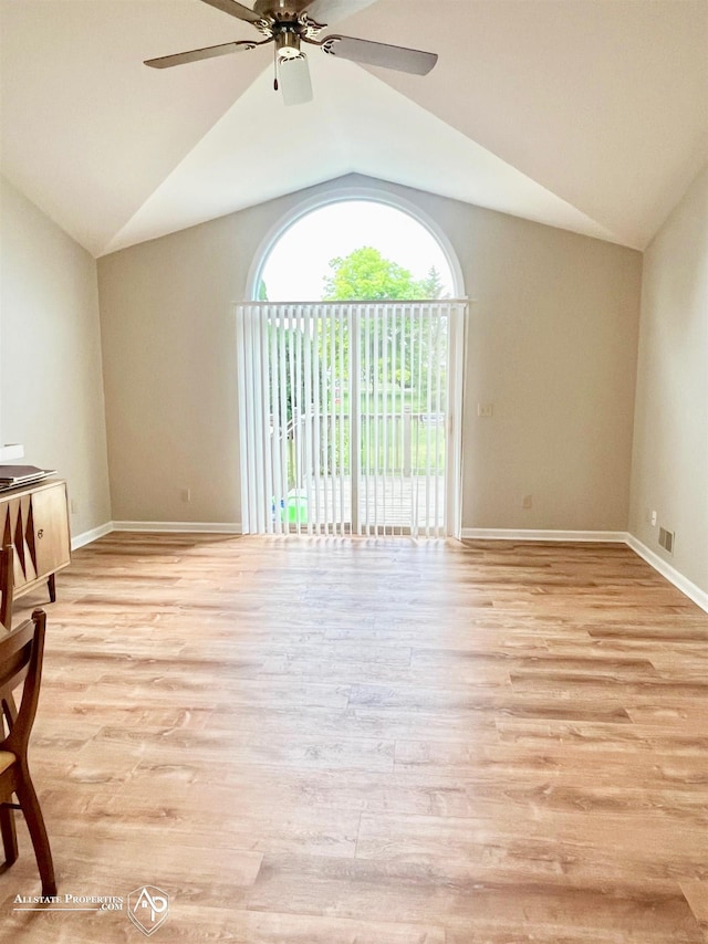 9330 Pinecrest Ct, Davison, MI 48423 - spare room featuring lofted ceiling, ceiling fan, and light wood-type flooring