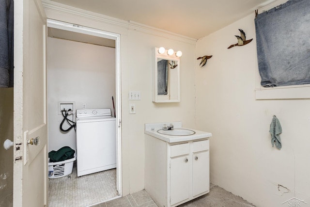 120 S Miami St, Saint Charles, MI 48655 - bathroom with washer / dryer, vanity, and tile patterned floors