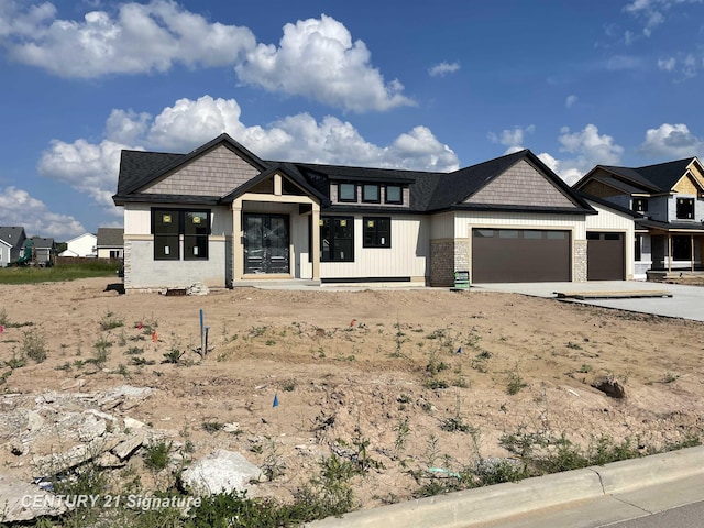 8884 Copper Ct, Freeland, MI 48623 - view of front of property with a garage and driveway