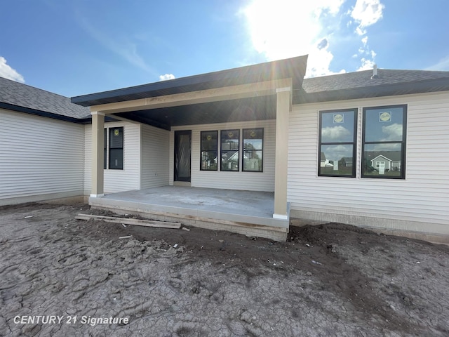 8884 Copper Ct, Freeland, MI 48623 - back of property with a porch