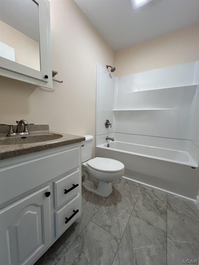 1999 Harold St, Adrian, MI 49221 - full bath featuring marble finish floors, vanity, and tub / shower combination