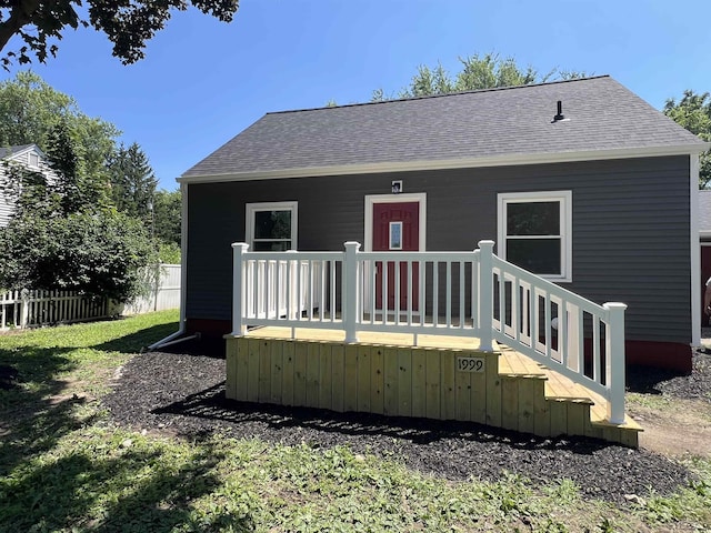 1999 Harold St, Adrian, MI 49221 - rear view of property with a shingled roof and a deck