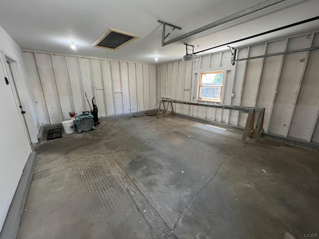 1999 Harold St, Adrian, MI 49221 - garage featuring a garage door opener
