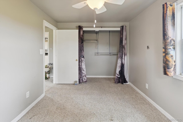 1612 Fischer Dr, Saginaw, MI 48601 - unfurnished bedroom with carpet floors, a ceiling fan, and a closet