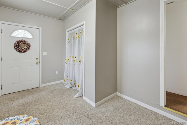1612 Fischer Dr, Saginaw, MI 48601 - foyer featuring baseboards and carpet floors