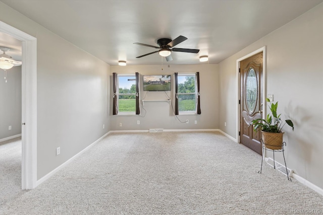 1612 Fischer Dr, Saginaw, MI 48601 - carpeted empty room with ceiling fan