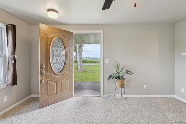 1612 Fischer Dr, Saginaw, MI 48601 - carpeted entrance foyer with baseboards and a ceiling fan