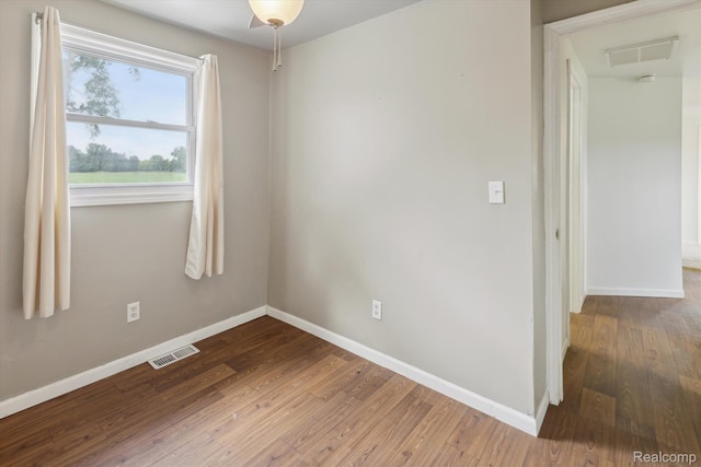 1612 Fischer Dr, Saginaw, MI 48601 - spare room with baseboards and wood finished floors