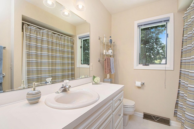 1410 Rothbury Dr NE, Grand Rapids, MI 49505 - bathroom with vanity and a shower with curtain
