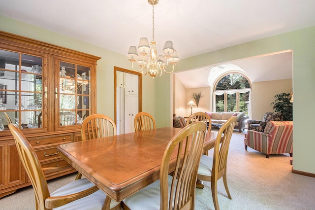 1410 Rothbury Dr NE, Grand Rapids, MI 49505 - dining space featuring light colored carpet and a chandelier