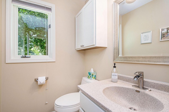 1410 Rothbury Dr NE, Grand Rapids, MI 49505 - half bathroom with toilet and vanity