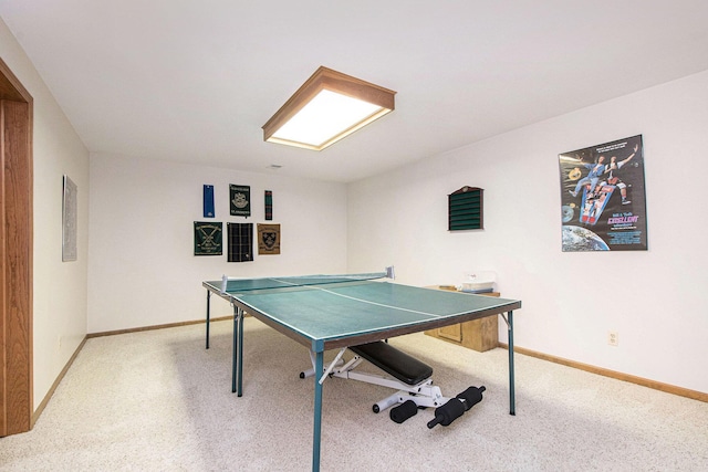 1410 Rothbury Dr NE, Grand Rapids, MI 49505 - recreation room with carpet flooring and baseboards