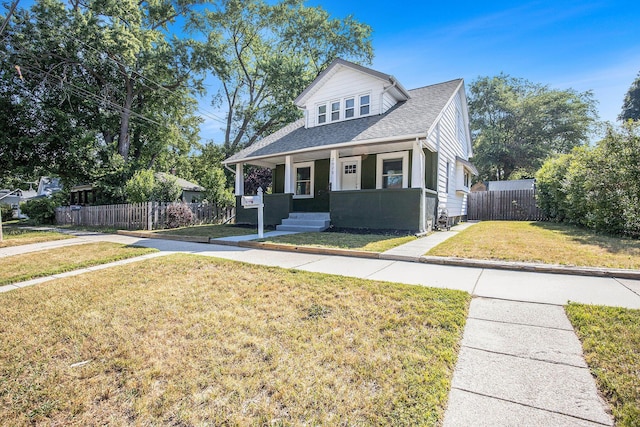 2028 Rowe Ave NE, Grand Rapids, MI 49505 - view of front of house with covered porch and a shingled roof
