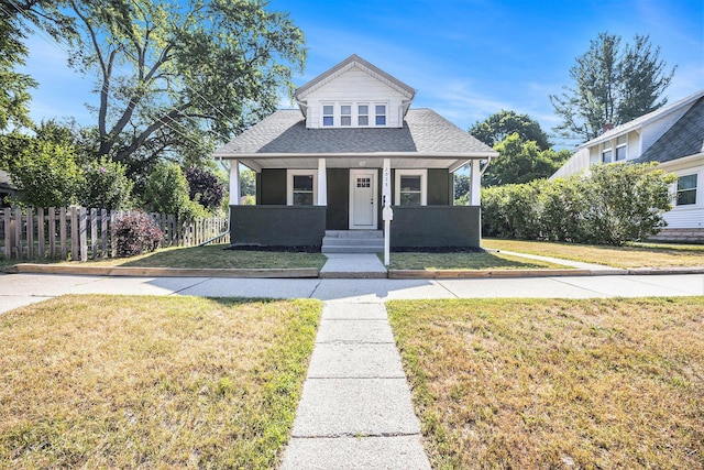 2028 Rowe Ave NE, Grand Rapids, MI 49505 - bungalow-style house with roof with shingles and covered porch