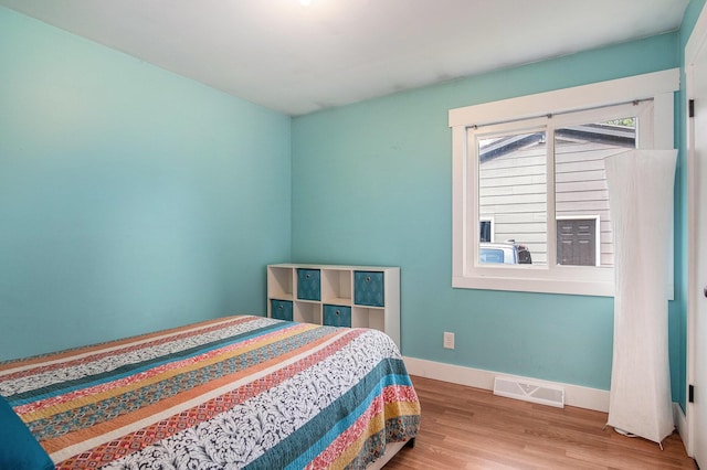 1836 Ridgewood Ave SE, Grand Rapids, MI 49506 - bedroom with wood finished floors and baseboards