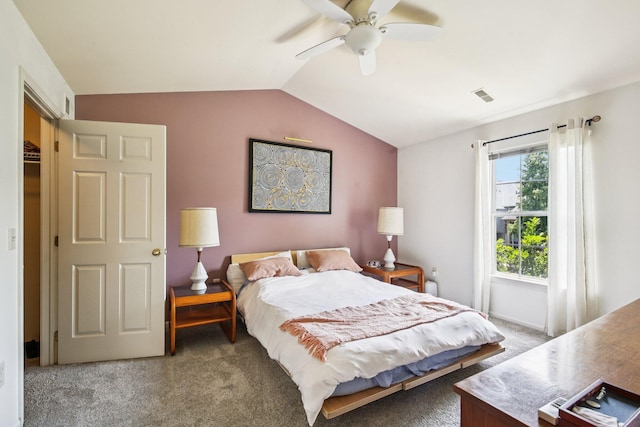 3197 Primrose Ln, Ypsilanti, MI 48197 - carpeted bedroom with lofted ceiling and a ceiling fan