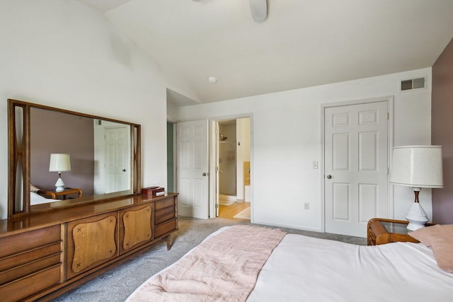 3197 Primrose Ln, Ypsilanti, MI 48197 - bedroom with light carpet, lofted ceiling, and connected bathroom