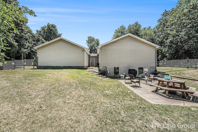 2851 18 Mile Rd, Kent City, MI 49330 - back of property with a patio