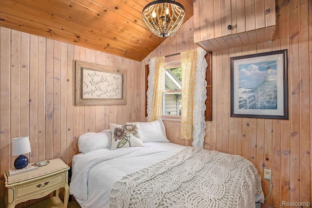 636 Swains Lake Dr, Concord, MI 49237 - bedroom featuring wooden walls, lofted ceiling, a chandelier, and wooden ceiling