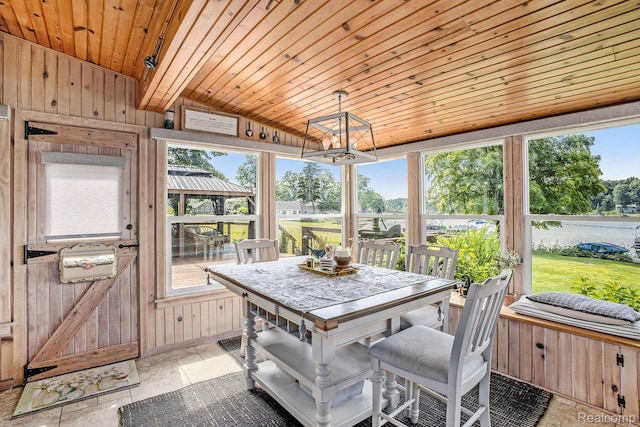 636 Swains Lake Dr, Concord, MI 49237 - sunroom / solarium featuring lofted ceiling and a chandelier
