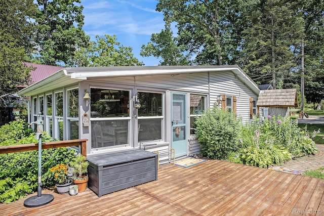 636 Swains Lake Dr, Concord, MI 49237 - wooden terrace featuring a sunroom