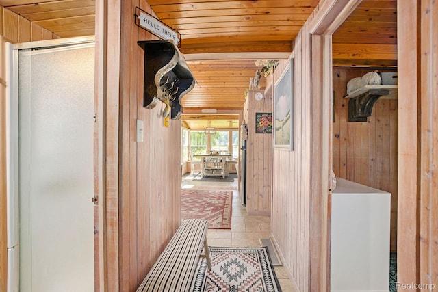 636 Swains Lake Dr, Concord, MI 49237 - hall featuring wood walls, wood ceiling, and light tile patterned flooring