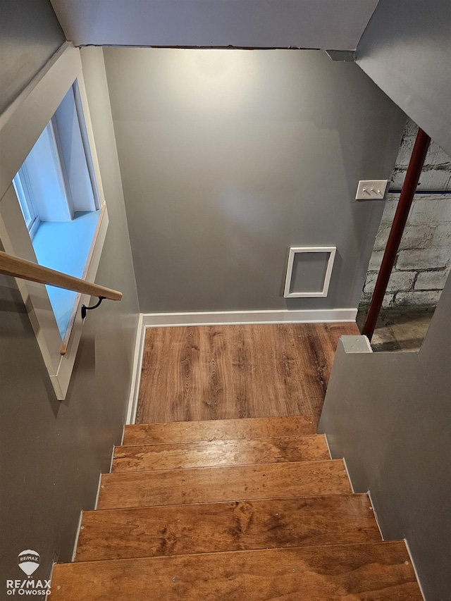 624 E Comstock St, Owosso, MI 48867 - staircase with wood finished floors