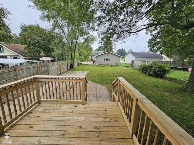 624 E Comstock St, Owosso, MI 48867 - deck featuring a fenced backyard