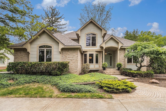 6512 White Lake Rd, Clarkston, MI 48346 - view of front of property featuring brick siding and a shingled roof