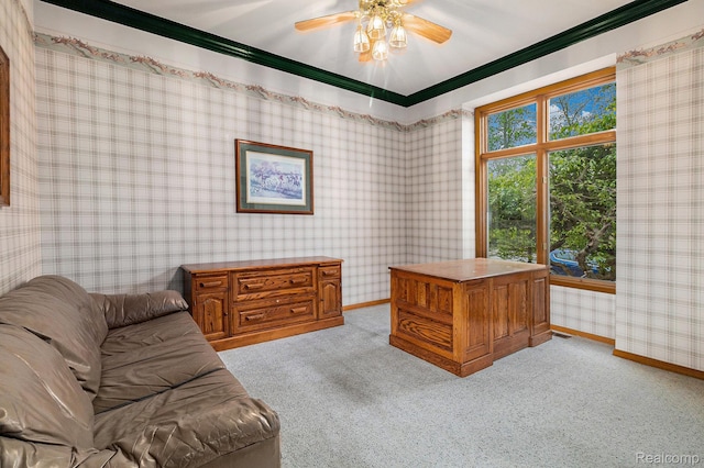 6512 White Lake Rd, Clarkston, MI 48346 - home office featuring wallpapered walls, ornamental molding, light carpet, and ceiling fan