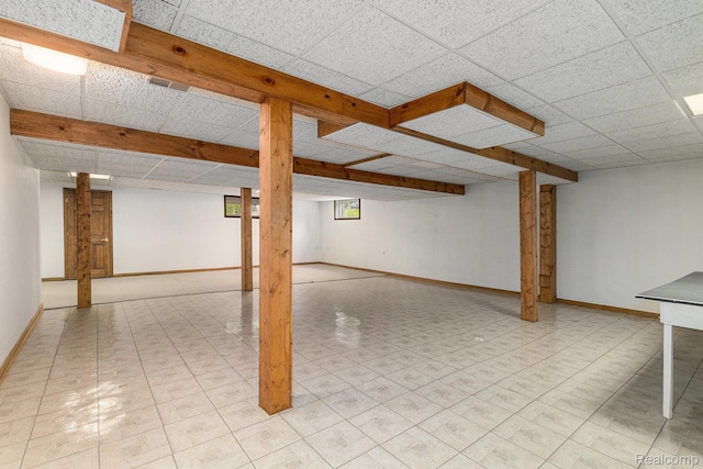 6512 White Lake Rd, Clarkston, MI 48346 - basement featuring a drop ceiling and baseboards