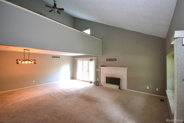 2 Cornell Ct, Dearborn, MI 48124 - unfurnished living room with a tiled fireplace, high vaulted ceiling, carpet flooring, and ceiling fan
