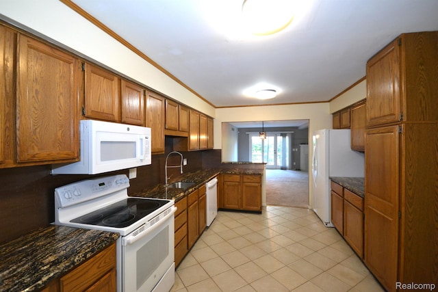 2 Cornell Ct, Dearborn, MI 48124 - kitchen with white appliances, brown cabinetry, a peninsula, decorative backsplash, and ornamental molding