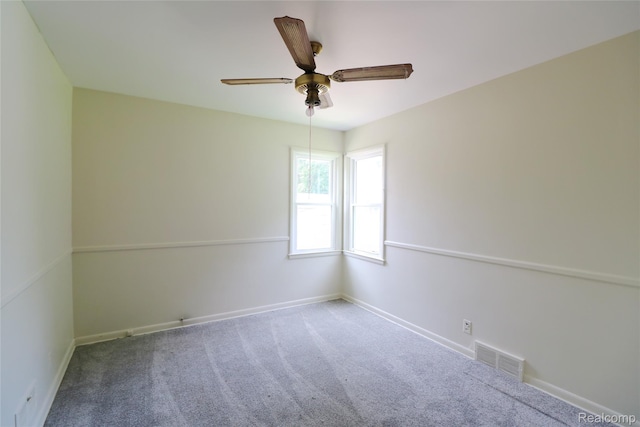 3922 Hogarth Ave, Flint, MI 48532 - spare room with carpet flooring and ceiling fan