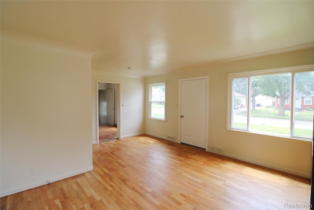 3922 Hogarth Ave, Flint, MI 48532 - unfurnished room featuring light wood finished floors and baseboards
