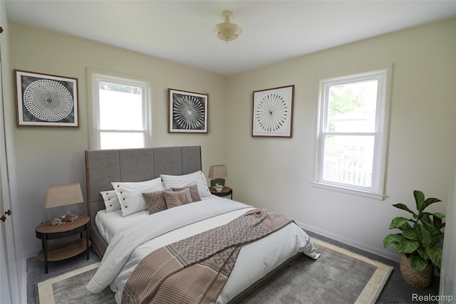 3922 Hogarth Ave, Flint, MI 48532 - bedroom with multiple windows and carpet