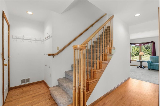 7350 N Territorial Rd, Dexter, MI 48130 - stairway featuring wood finished floors and recessed lighting