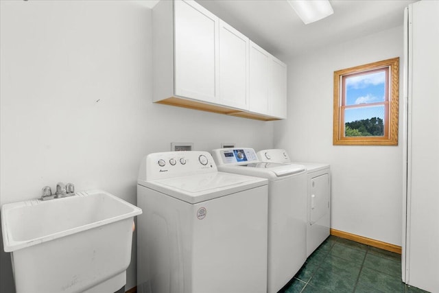 7350 N Territorial Rd, Dexter, MI 48130 - laundry room featuring washer and dryer and cabinet space