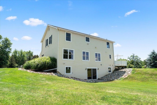 7350 N Territorial Rd, Dexter, MI 48130 - back of property featuring a yard
